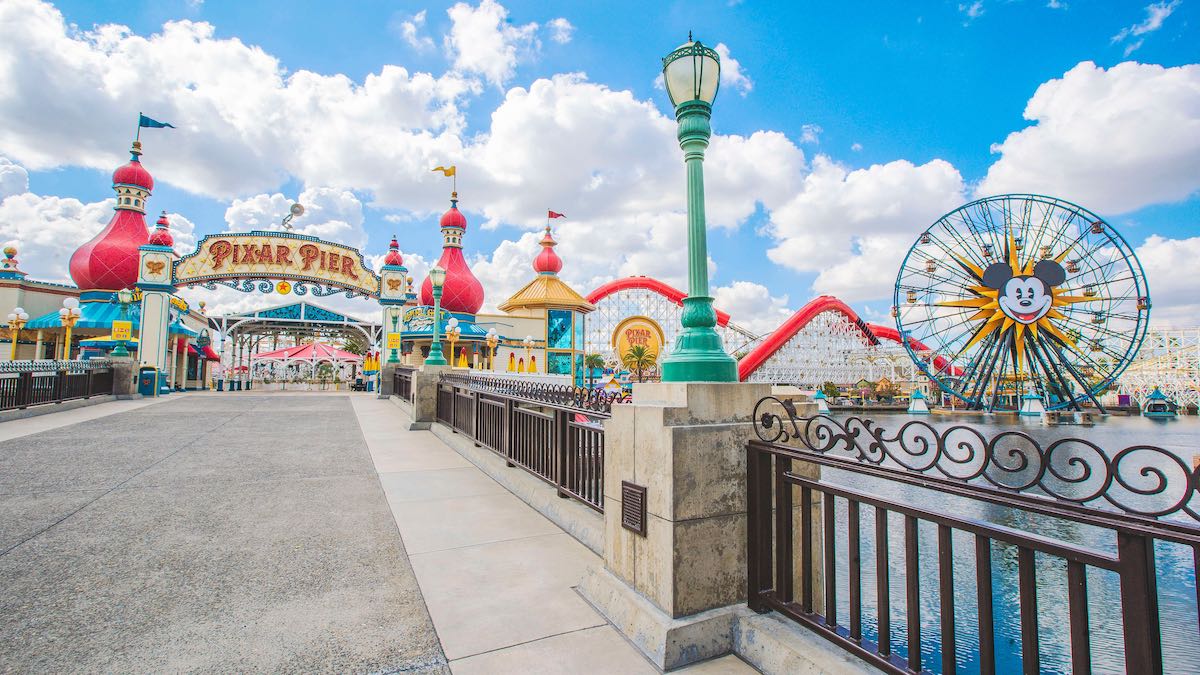Landscape view of the entry to Pixar Pier and its attractions in the background