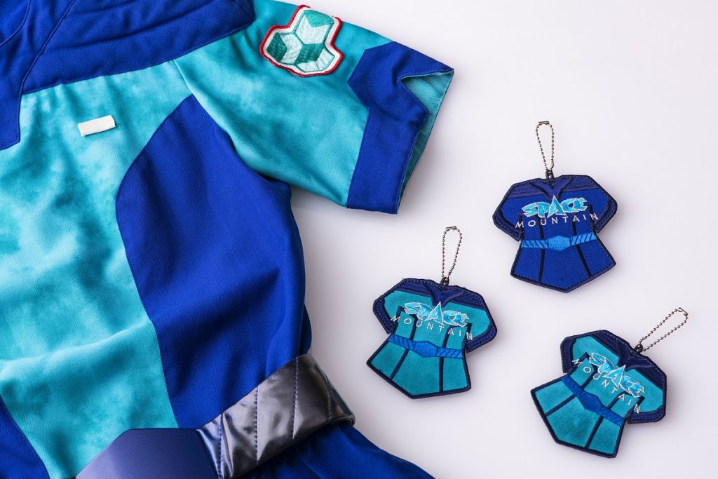 badges made from upcycled Space Mountain costumes at Tokyo Disney
