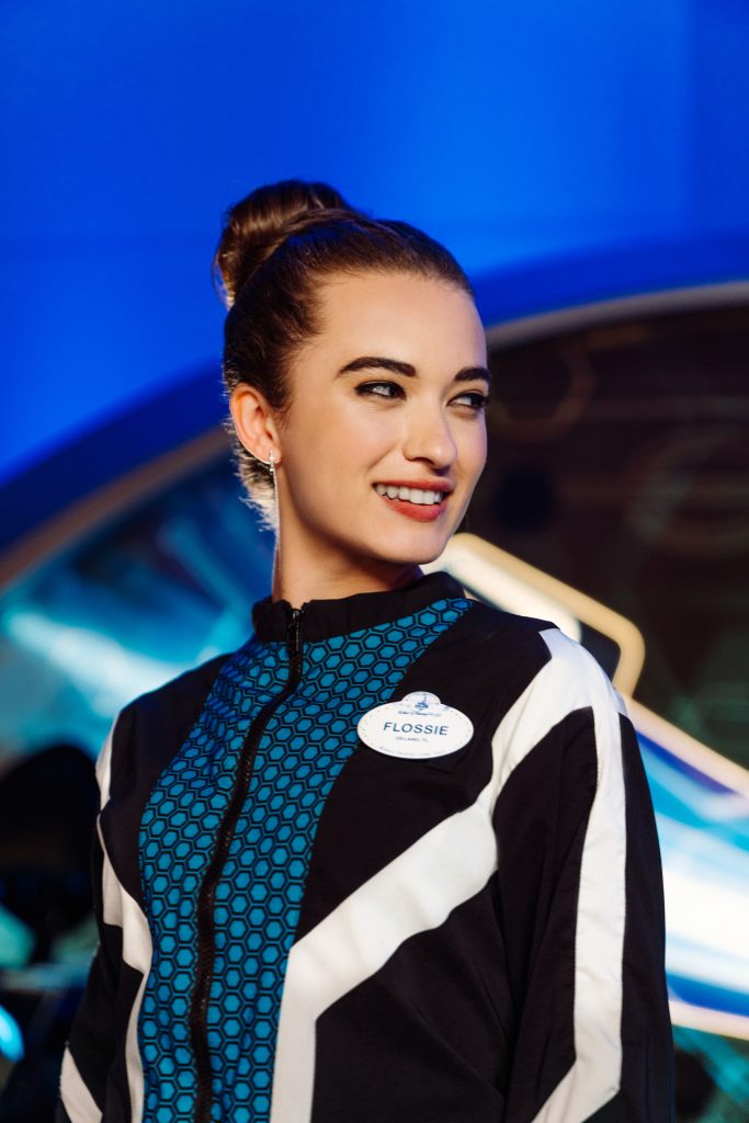 Female cast member wears Tron costume made from recycled plastics