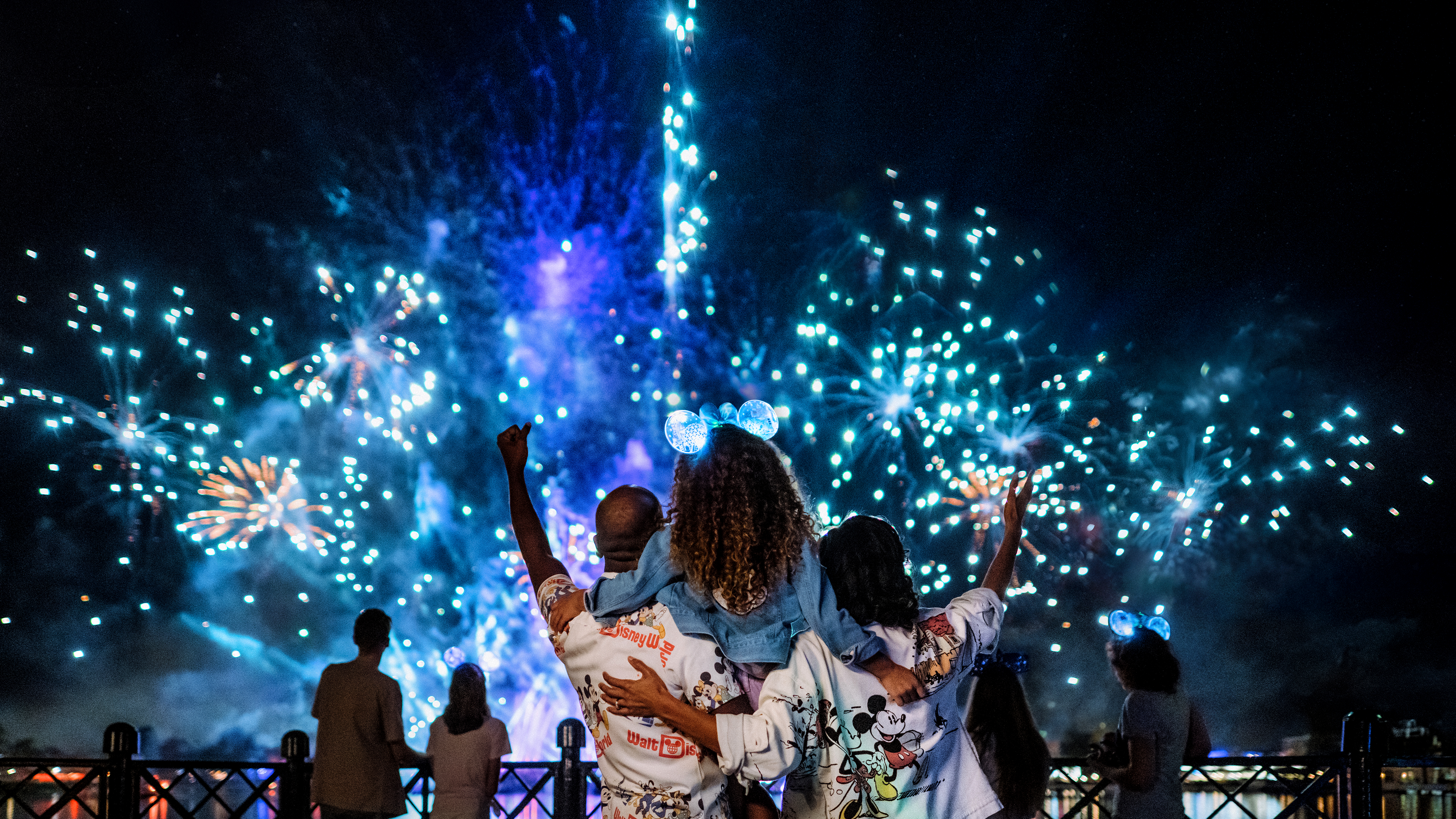 Family watching firework show at Epcot