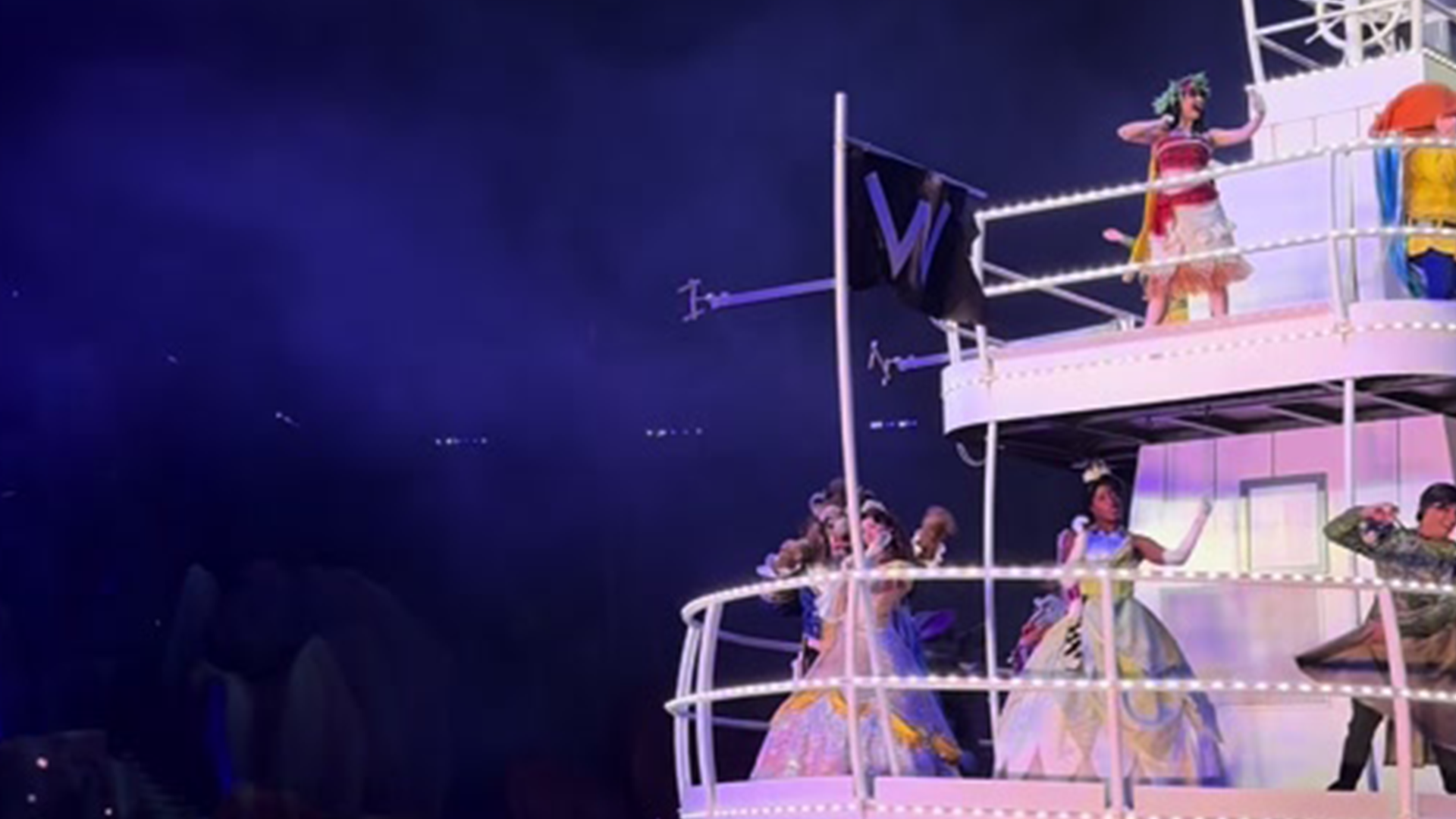 Disney characters wave from the Mark Twain Riverboat