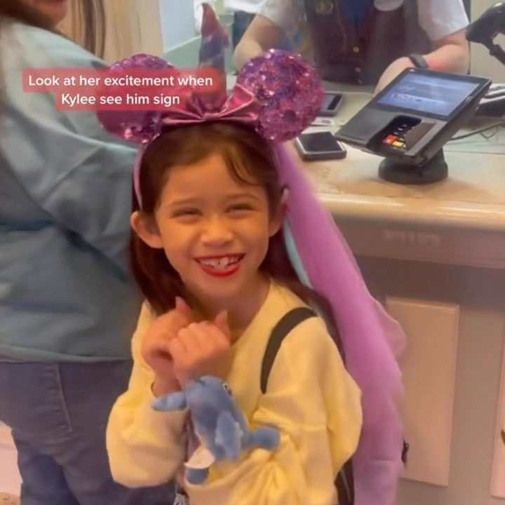 A young girl smiles