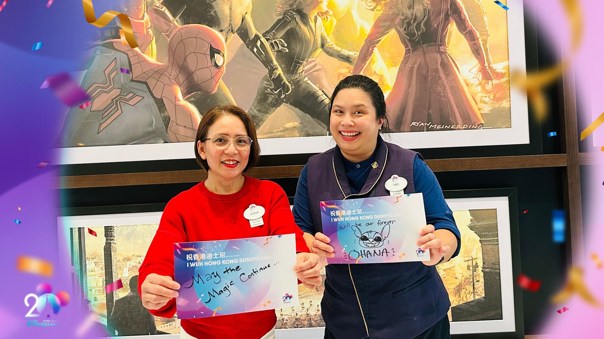 Two women holding notes