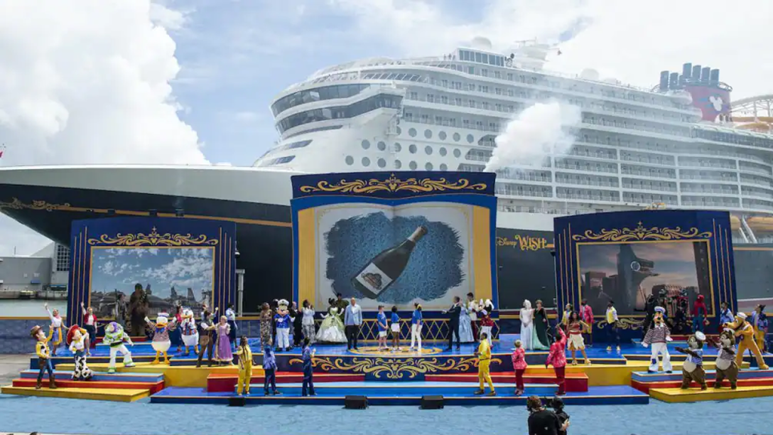 Performers and Executives onstage at the Wish Christening in front of the new ship.