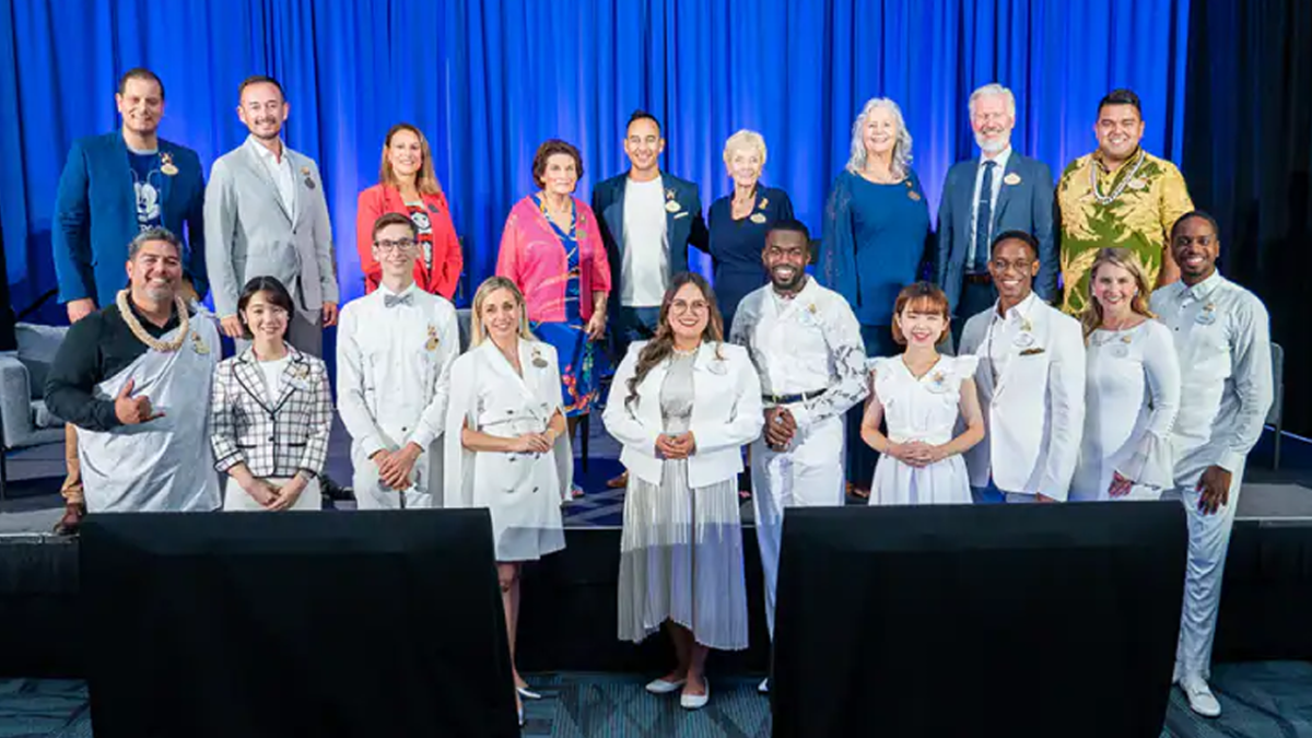 Past and Present Disney Ambassadors gather for a photo.