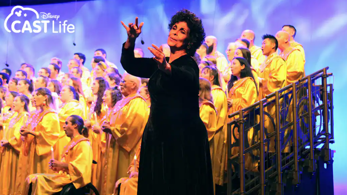 Angela signing onstage at EPCOT's Candlelight Processional.