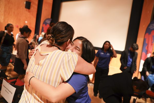 women hugging
