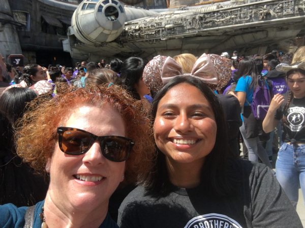women smiling at disneyland galaxy's edge