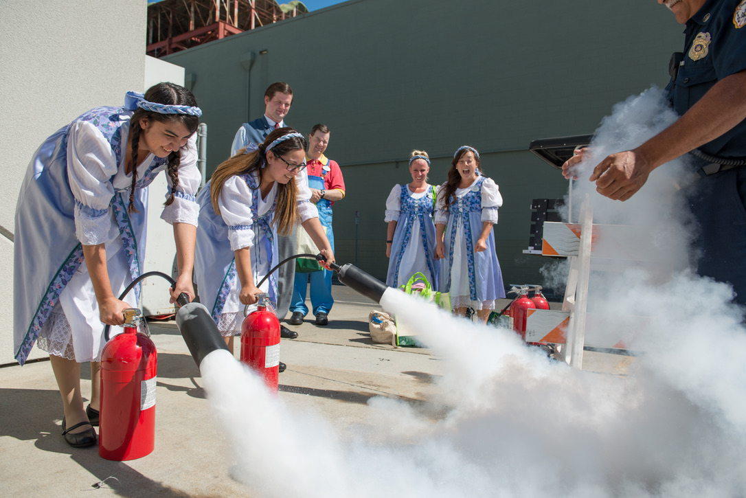 Fairy Godmother’s Apprentices from Bibbidi Bobbidi Boutique participated in a fire extinguisher training with the Disneyland Fire Department.