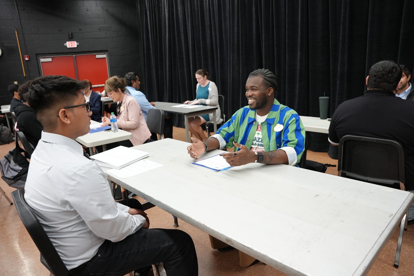 Participants of Orange County United Way take part in mock interviews with Disneyland Resort cast members.