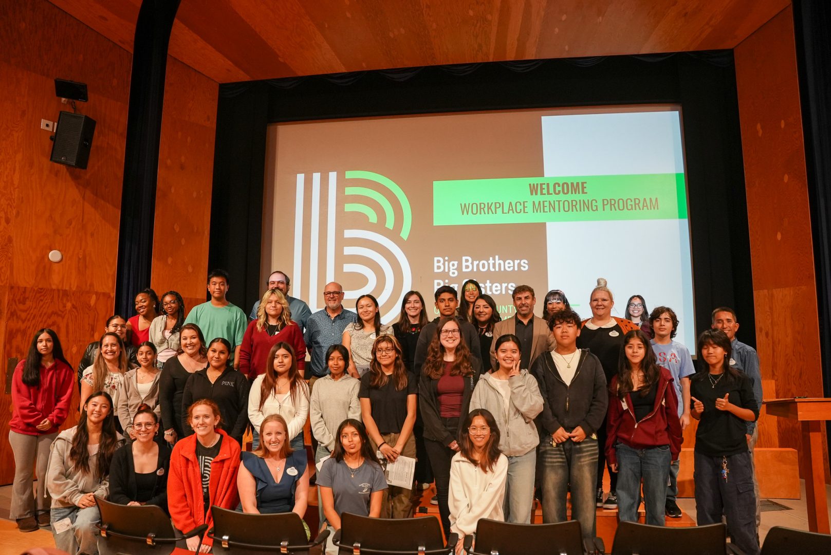 Mentors and mentees in Big Brothers Big Sisters of Orange County & the Inland Empire smile together at the start of their program.