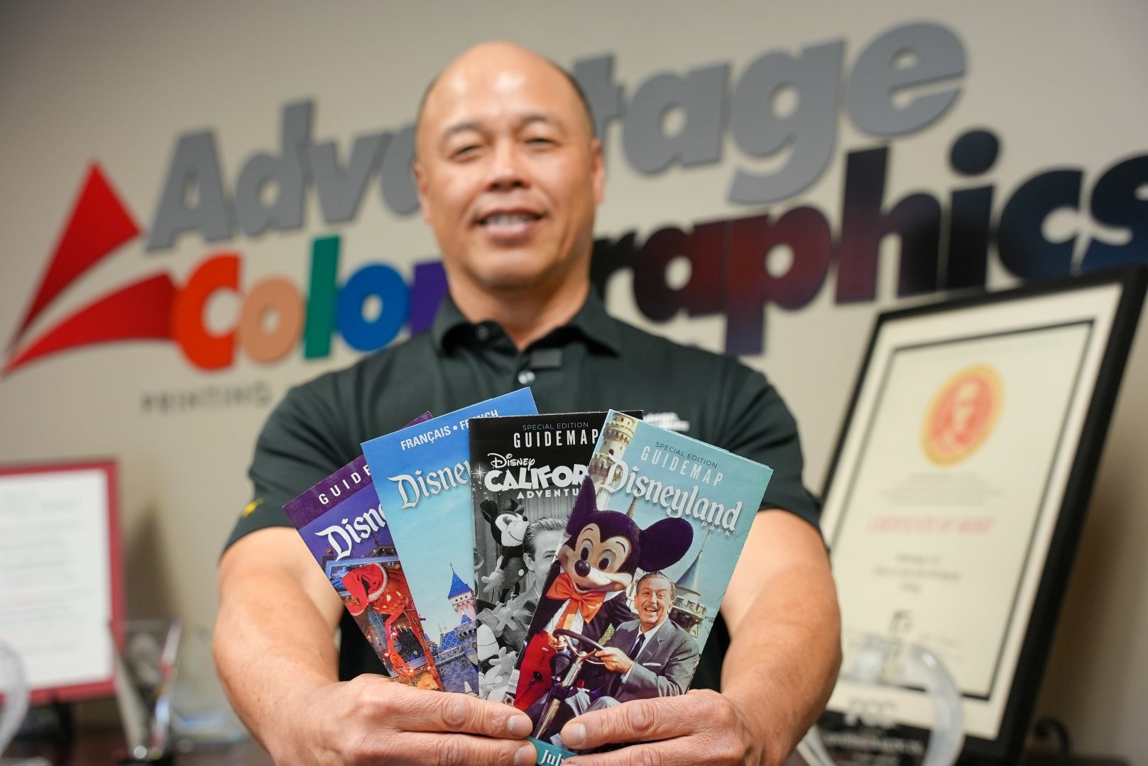 Tom with just a few of the historic maps his team has helped print over the years.