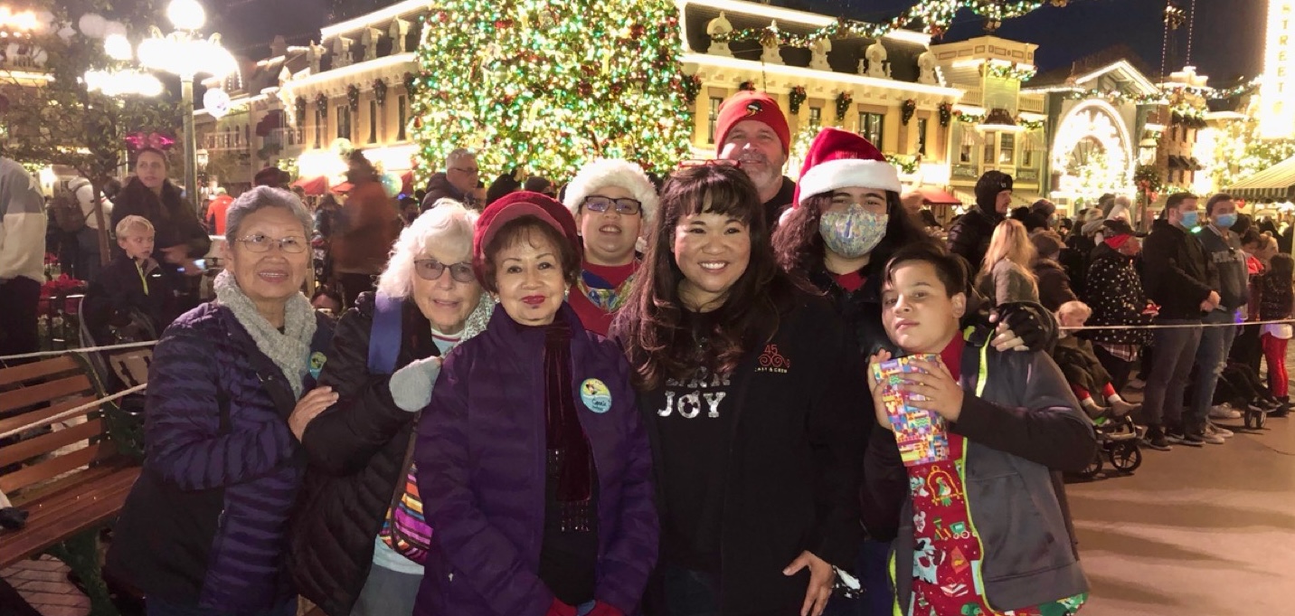 Ken and Christine with their children, mothers and aunt during their annual holiday celebration at the resort.