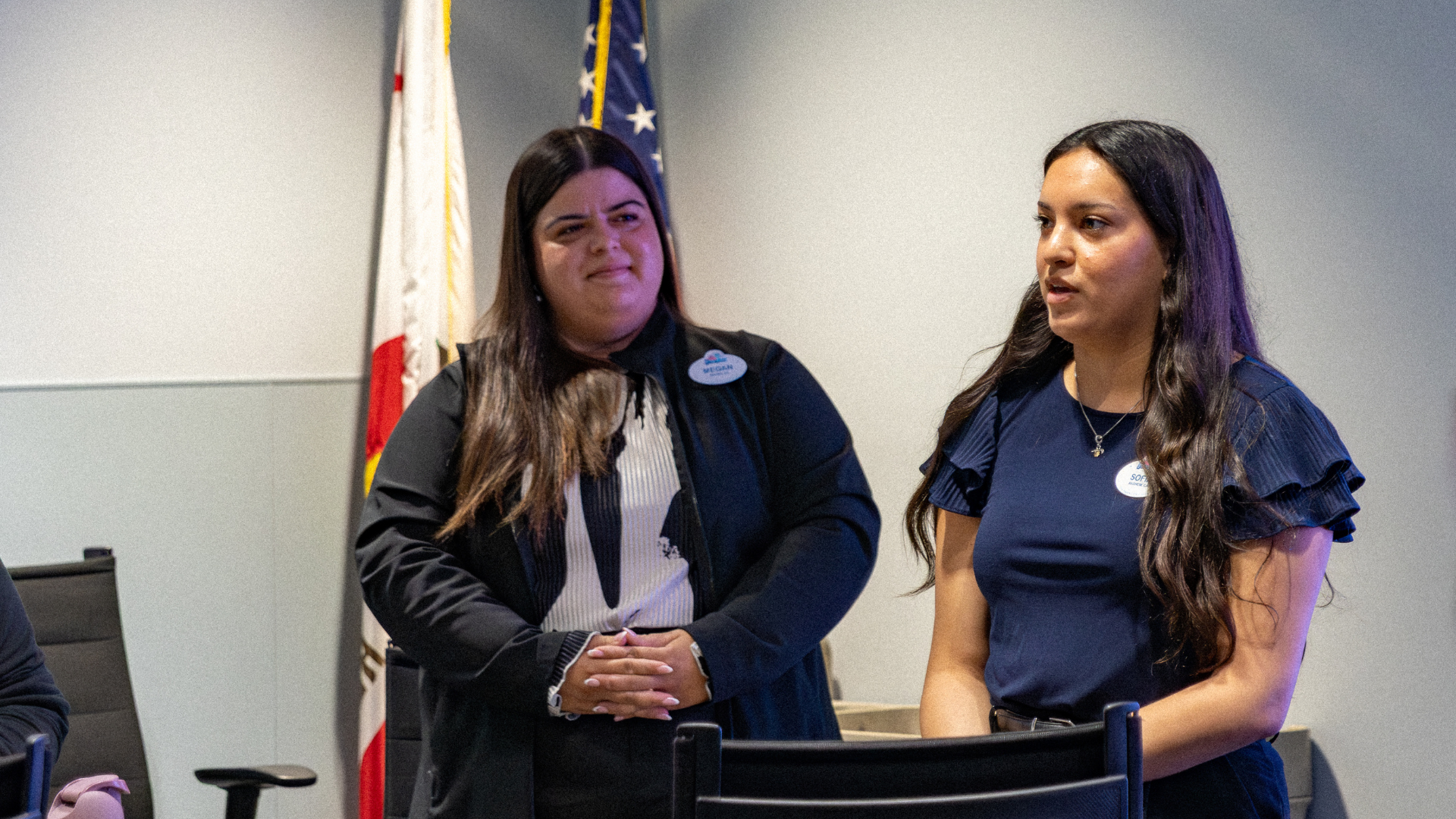Megan looks over at Sofia and intently listens as she shares her &ldquo;Toast for Change,&rdquo; where she spoke words of gratitude for Megan&rsquo;s guidance and advice throughout the program.