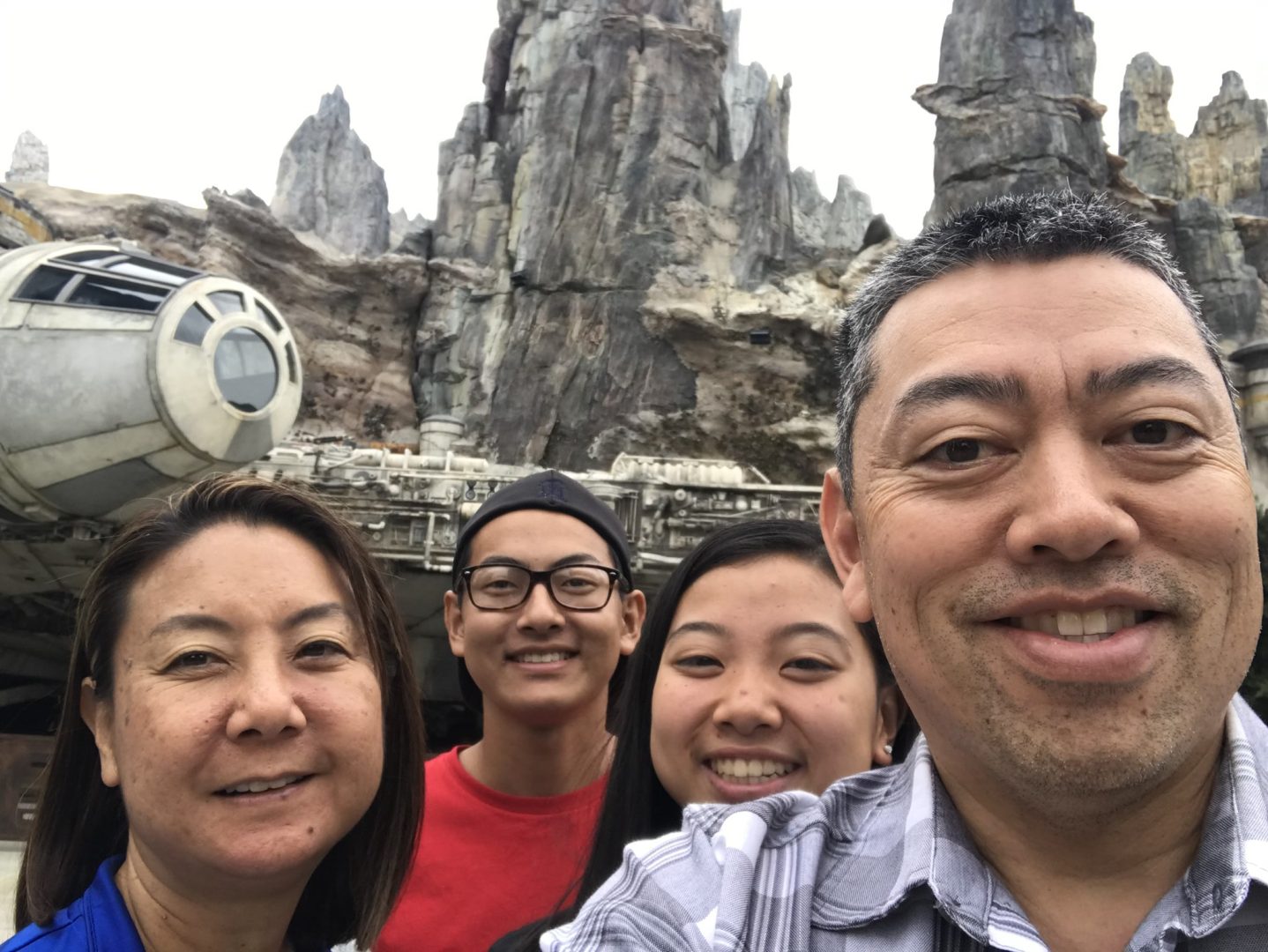 Nate and his family on a traditional trip to Disneyland park in 2019, snapping a selfie while visiting Star Wars: Galaxy&rsquo;s Edge.